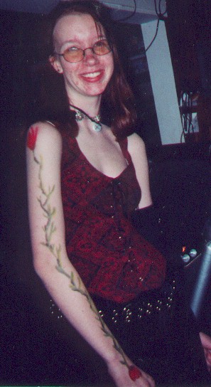 Thera (Thei) C'intrigue looking pleased about something.