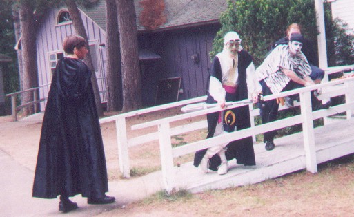 Members of Conundrum, leaning on someone else's railing, as ours has gone missing.