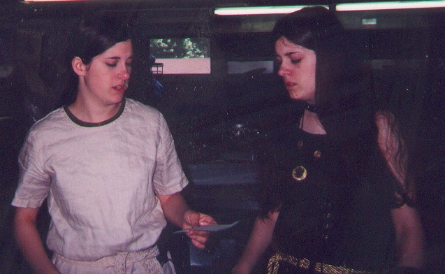 The tavern wenches, discussing an order.